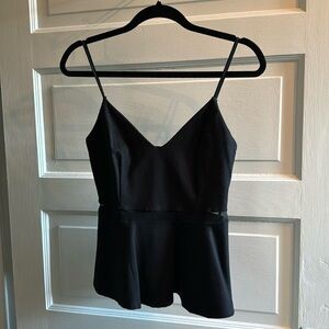 Black peplum tank with sheer detailing